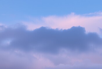 Obraz premium Soft pastel clouds with pink and blue