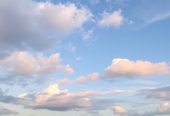 Obraz premium Soft pastel clouds with pink and blue