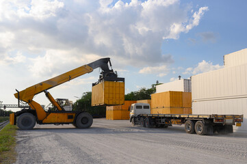 Cargo planes flying over container trucks and forklifts are used for the logistics industry.