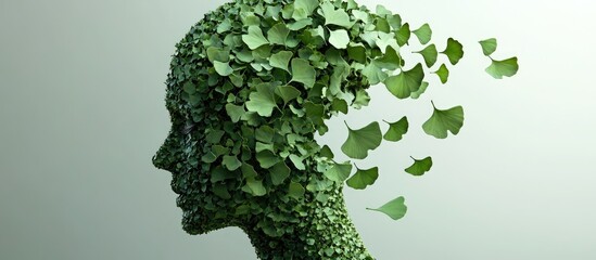 Fototapeta premium Concept of memory decline and cognitive impairment associated with dementia depicted through a 3D illustration featuring a human head formed by ginkgo biloba leaves