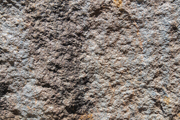Texture of grey rough granite for use in architectural finishing.