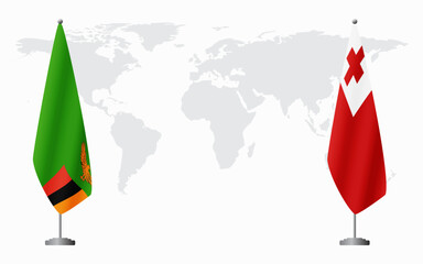 Zambia and Tonga flags for official meeting against background of world map.