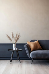 Stylish gray sofa with cozy cushion and decorative vase placed beside modern side table in minimalist living room