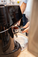 Close shot for preparing coffee in coffee machines, no face