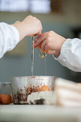Close shot for preparing pastry and desserts, rolling dough, measuring ingredients, putting together elements 