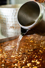 Close shot for preparing pastry and desserts, rolling dough, measuring ingredients, putting together elements 