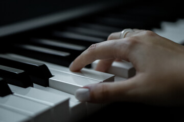 Fototapeta premium Close-Up Shots of Playing Piano Keys