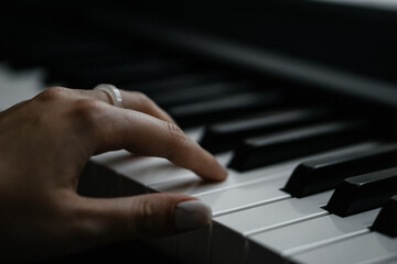 Fototapeta premium Close-Up Shots of Playing Piano Keys
