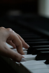 Obraz premium Close-Up Shots of Playing Piano Keys