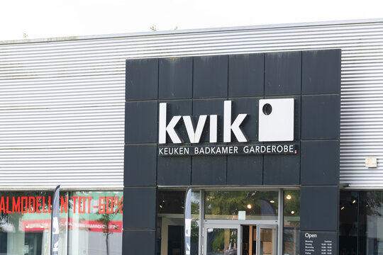 22 september 2024, Genk, Belgium. Kvik kichen manufacturer, brand name on signboard on facade  on modern building exterior. Commercial activity, kitchen designer kitchen installing business.