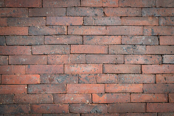 Fototapeta premium This backdrop features a rustic arrangement of worn bricks, showcasing unique textures and earthy tones.