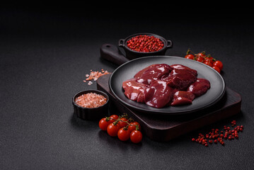 Fresh raw chicken or beef liver with salt, spices and herbs