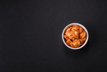 Ravioli with meat or vegetarian with ricotta, salt and spices
