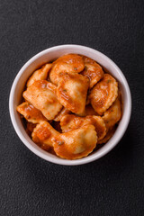 Ravioli with meat or vegetarian with ricotta, salt and spices