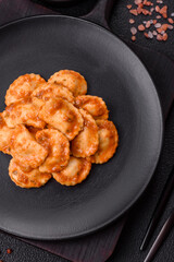 Ravioli with meat or vegetarian with ricotta, salt and spices