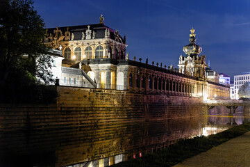 Dresden, Germany August 14 2024: Dresden Zwinger photographed from the outside, illuminated, at night in Dresden