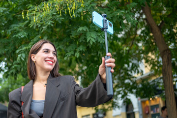 Woman Taking a Solo Selfie in the City