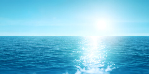 Obraz premium A bright blue background of a warm spring, summer sky and distant horizon over a blue ocean or sea with light reflecting off the surface from sun flare on the right.