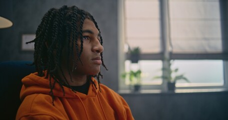 African American teenager discusses psychological trauma, finds solutions during therapy session....