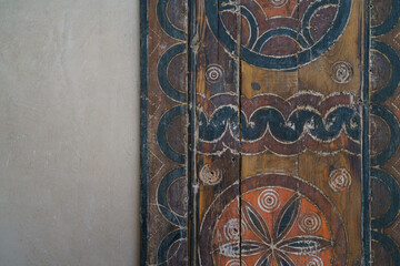 wooden door with colorful ornament 