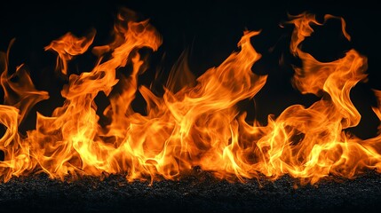 Captivating close-up of vibrant flames dancing against a dark background, showcasing the intense energy and warmth of fire.