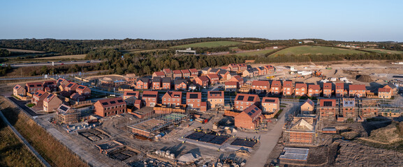 Aerial panoramia view directly above a new build housing estate in the UK
