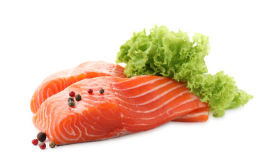 Pieces of fresh salmon, peppercorns and lettuce isolated on white