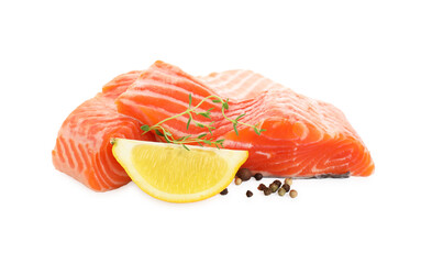 Pieces of fresh salmon, thyme, lemon and peppercorns isolated on white