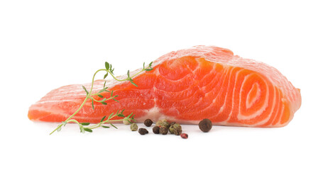 Piece of fresh salmon, peppercorns and thyme isolated on white