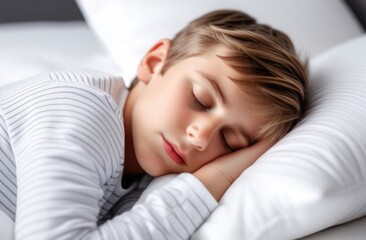 Close-up. A child sleeps on a bed with white sheets. Healthy sleep concept.