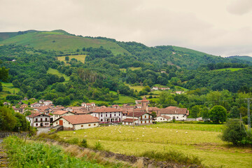 Obraz premium Erratzu. Navarre. Spain. This secluded and quiet place, surrounded by mountains, is located in the Baztan Valley near the border with France. It is the starting point to visit the Xorroxin waterfall