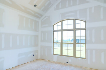 New house drywall walls ceilings have been plastered are ready to be primed for painting