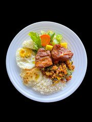 plate of food with rice beans salad and meat healthy food