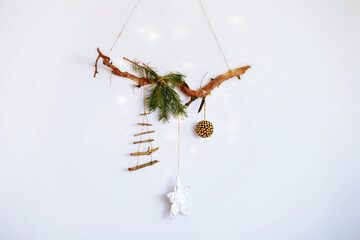 New Year's decor made of natural materials . Handmade Christmas wreath on the wall