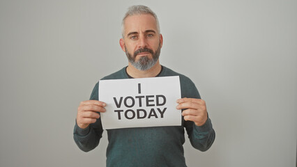 A bearded, adult man holding a 'i voted today' sign against a white background, embodying civic...