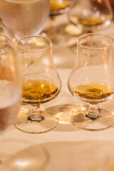 whiskey tasting with samples in glencairn glasses 