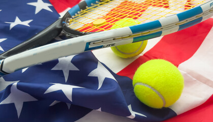 Tennis tournament: racket, balls and American flag, sports and competition concept 