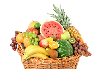 Many different fresh fruits in wicker basket isolated on white