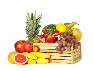 Wooden crate with many different fresh fruits isolated on white
