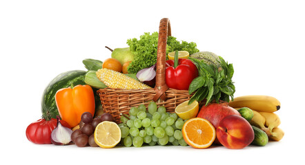 Different fresh fruits and vegetables in wicker basket isolated on white
