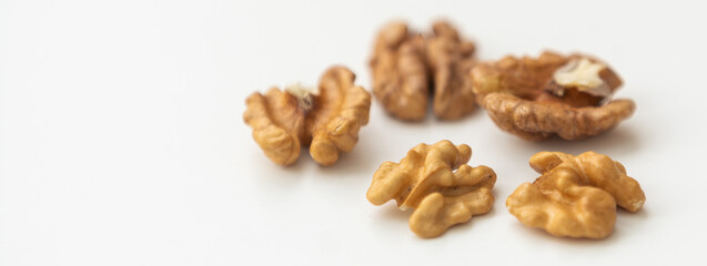 Half a walnut isolate. Peeled walnut on white. Walnut top view. Set with clipping path. Full depth of field