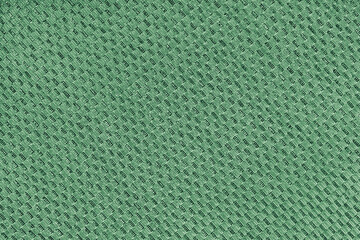 Texture of green jacquard fabric of diagonal rough weave cloth structure macro background