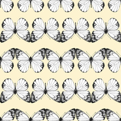 Seamless pattern of realistic butterfly. Hand drawn illustration. Painted  butterflies elements on yellow background. Animal motif. Black and white. For fabric, textile, design, banner, wrapping paper