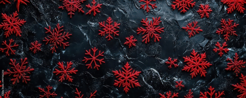 Aufkleber abstract christmas background with red snowflakes on a black surface, adding a touch of festive char