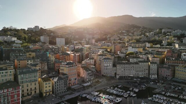 Discovering bastia's charming harbor at sunset in corsica