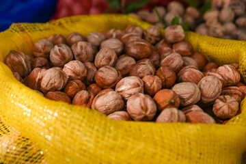 a bag of shelled walnuts, shelled walnuts in yellow sack