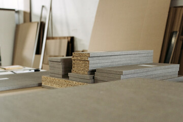 Stacks of Particleboard Sheets Ready for Furniture Production