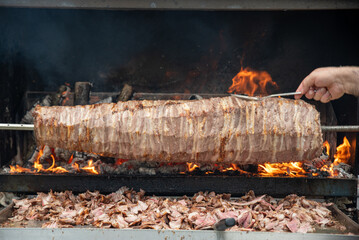 Wood fired Turkish Cag Kebab Doner. Cag kebab, a traditional Turkish cuisine dish made from lamb...