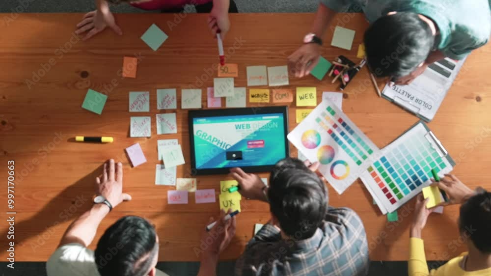 Poster top view of skilled business people working together to design web design. aerial view of designer b