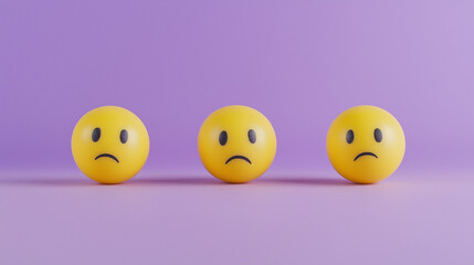 Naklejka premium emotional, mood, sadness concept: three yellow balls with sad faces arranged in a slightly slumped pattern against an isolated lavender background